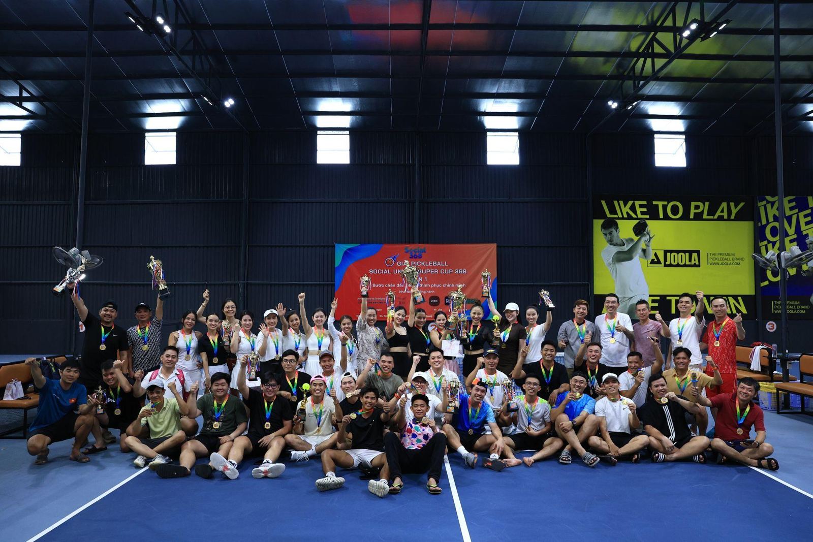 Players with trophies and medals at United Pickleball